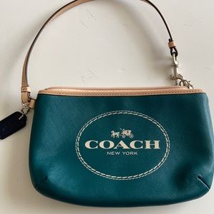 Coach wristlet teal with signature logo graphics NWOT